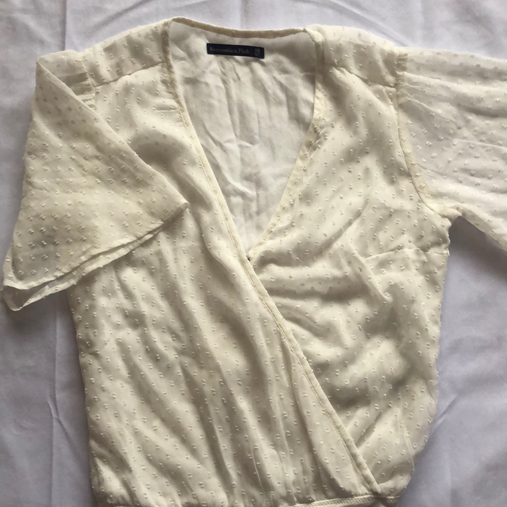 Short sleeve point d’esprit bodysuit